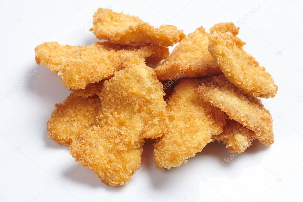 chicken nuggets on white background, close-up 