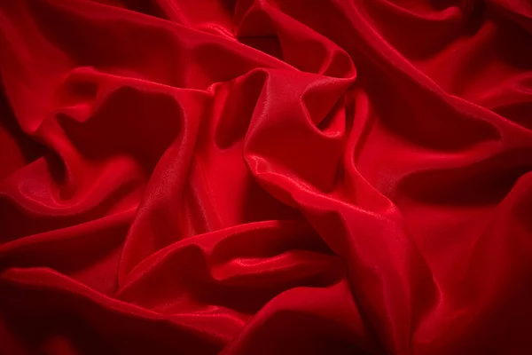 Luxury red satin smooth fabric background for celebration