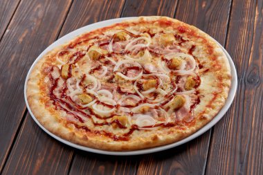 tasty pizza on wooden background, close-up 