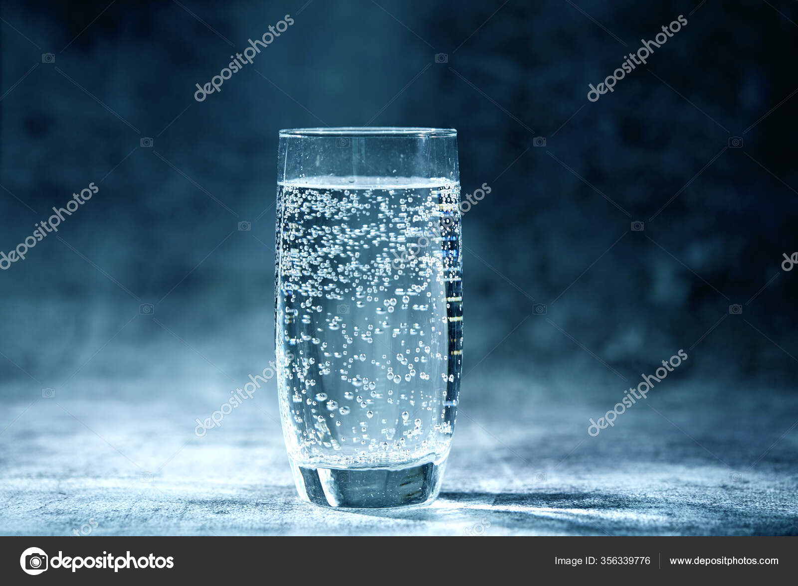 Glass Sparkling Water Grey Background Stock Photo by ©strelok 356339776