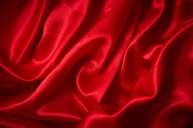 Kutlama, tören, davet kartı veya reklam afişi için lüks kırmızı saten düz kumaş arkaplan