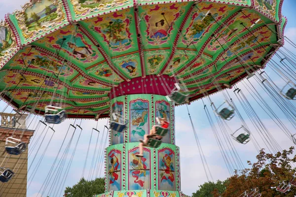 VIENNA, AUSTRIA - AUGUST  17, 2012: View of Merry-go-round spinn — Stock Photo, Image