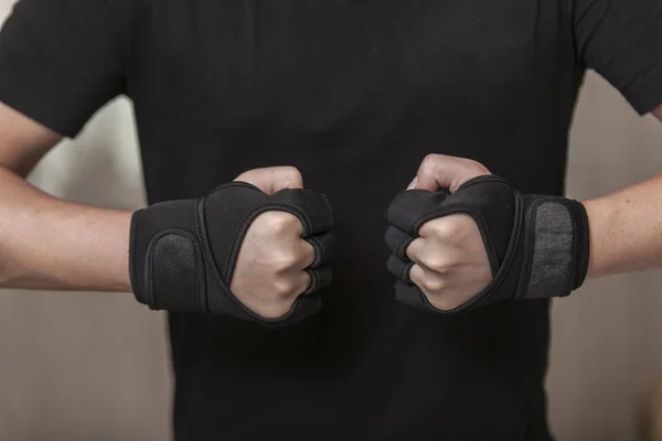 Man athlete in gloves — Stock Photo, Image