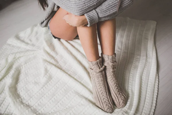 Cozy winter evening , warm woolen socks — Stock Photo, Image