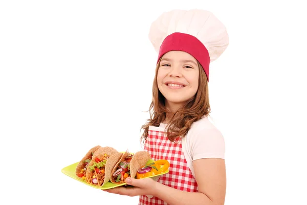 Heureuse petite fille cuisinier avec tacos restauration rapide — Photo