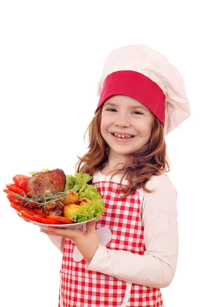 Little girl cook with roasted turkey drumstick — Stock Photo, Image