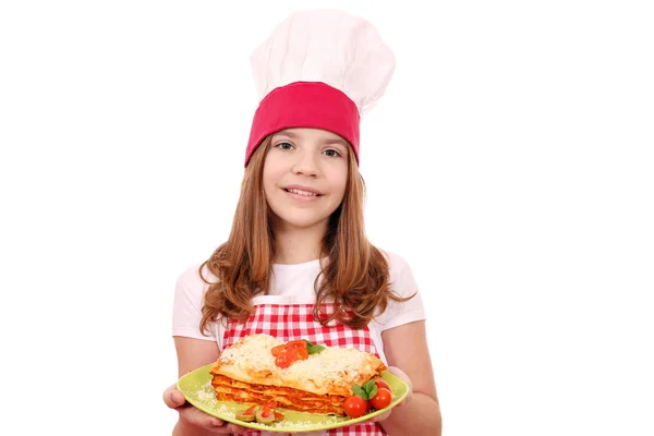 Happy little girl cook with Italian lazagne — Stock Photo, Image
