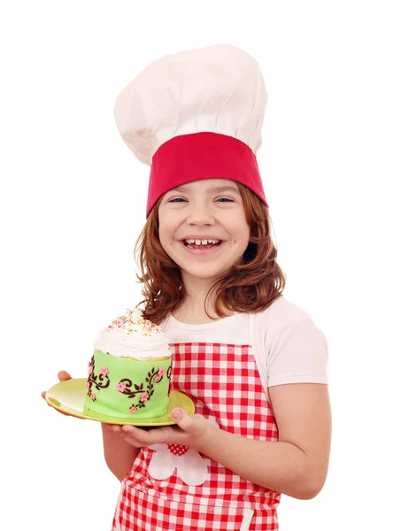 Menina feliz cozinhar com bolo — Fotografia de Stock
