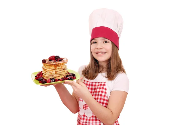 Malé radostné holčičky vařit s Sladké palačinky — Stock fotografie