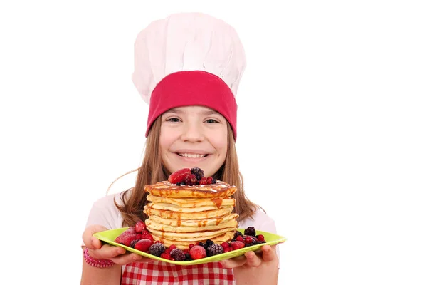 Feliz niña cocinera con panqueques —  Fotos de Stock