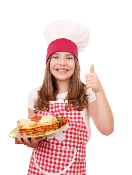 Happy little girl cook with Italian lasagne and thumb up — Stock Photo, Image