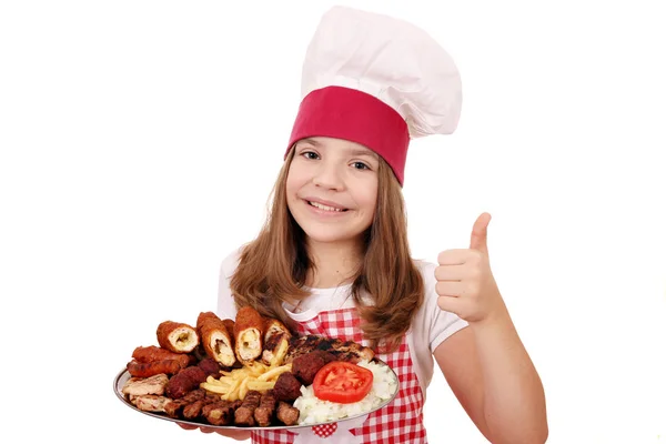 Happy little girl cook with grilled meat and thumb up — Stock Photo, Image