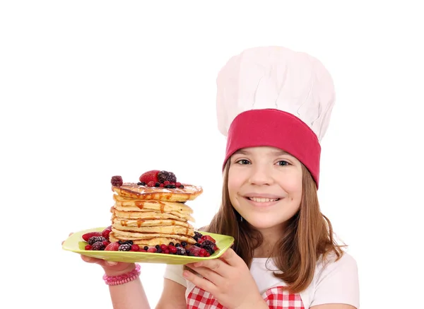 Happy little girl cook with pancakes — Stock Photo, Image