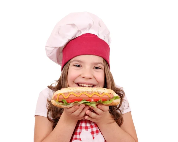 Happy little girl cook with hot dog — Stock Photo, Image