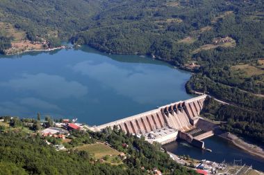 hydroelectric power plant on river landscape clipart