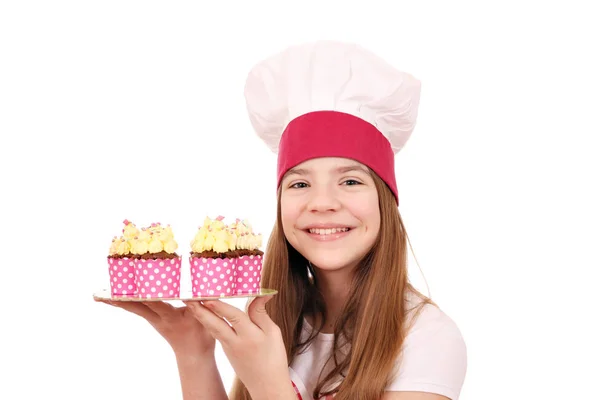 Menina feliz cozinhar com bolos sobremesa — Fotografia de Stock