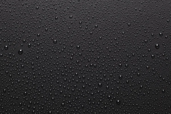 Black background with water drops — Stock Photo, Image