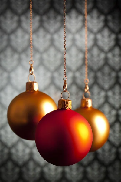 Tři vánoční ozdoby na tapetu pozadí — Stock fotografie