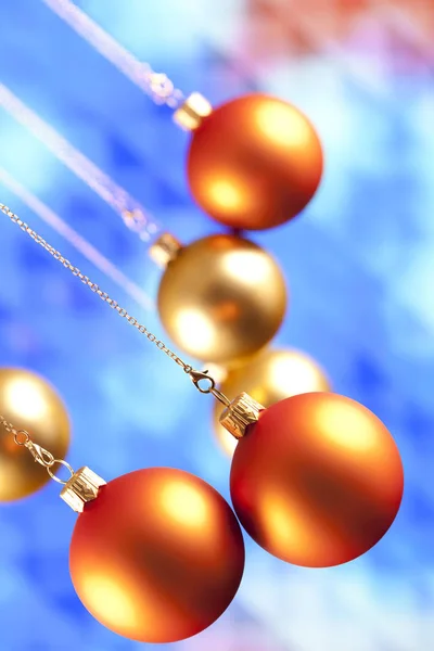 Christmas baubles on blue background — Stock Photo, Image