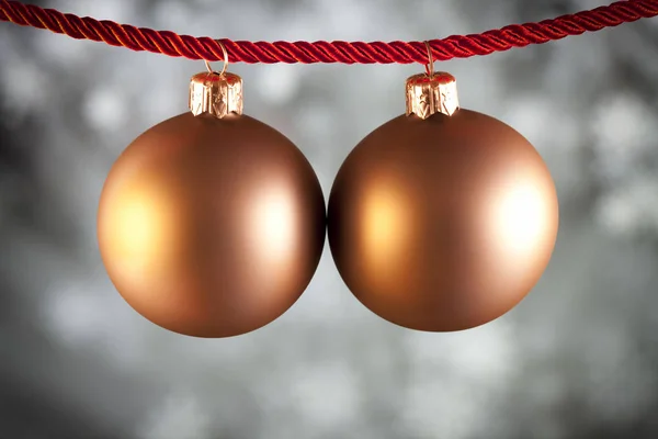 Christmas baubles on black and white background