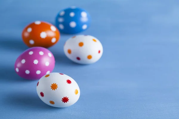 Easter eggs on blue background — Stock Photo, Image