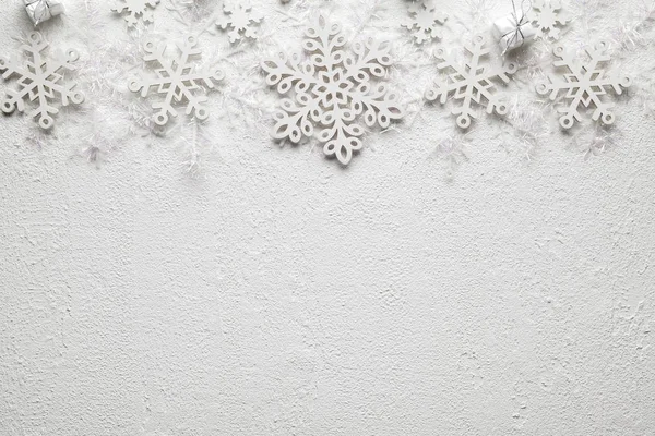 Christmas background - gifts and snowflakes on white background Royalty Free Stock Images