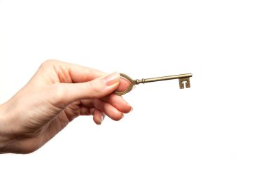 Eski moda kadın anahtarı elle izole edilmiş.