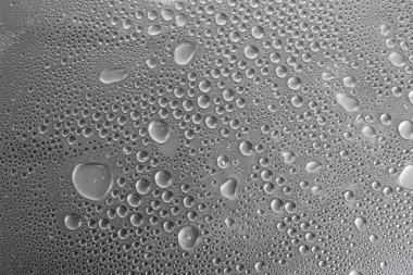 Hafif arkaplanda su damlalarının dokusu