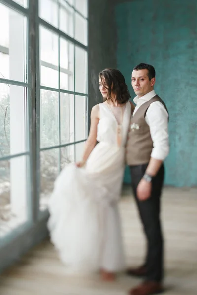 The bride and groom in the studio — Stock Photo, Image