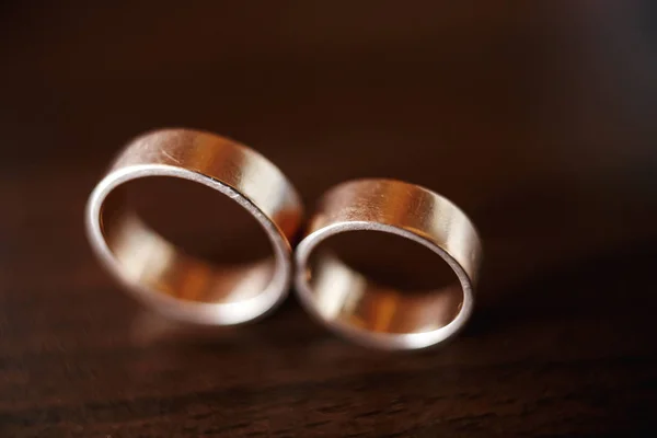 wedding rings on the table