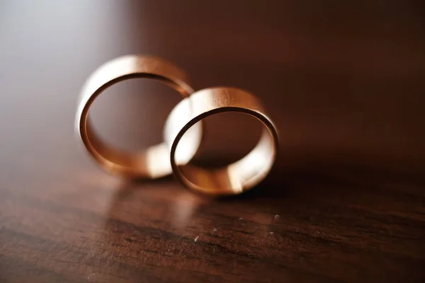 wedding rings on the table