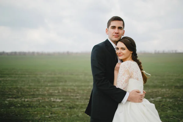 Groom with the bride on a walk — Stock Photo, Image