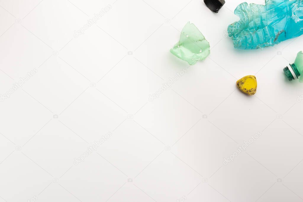 Heap of plastic garbage isolated on white background, copy space