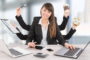Multitask business woman with many hands. Performing several actions at the same time.