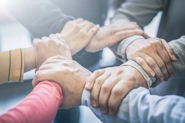 Dramatic Moment Group People Hold Strong Hands Sign Trust Teamwork — Stockfoto