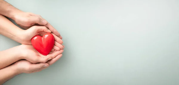 Adult Mother Child Hold Red Heart Hands Concept Charity Health — Stockfoto