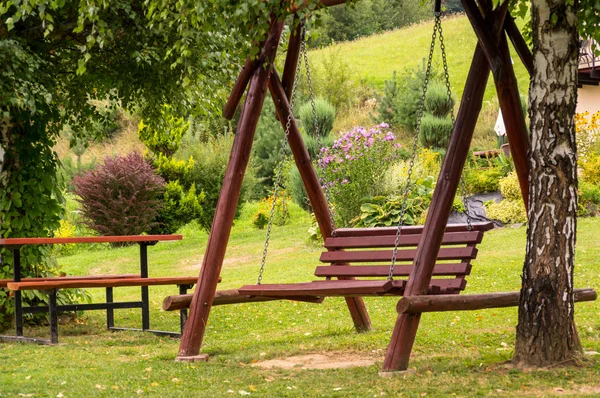 Hanging Bench Beetwen Trees — Stock Photo, Image