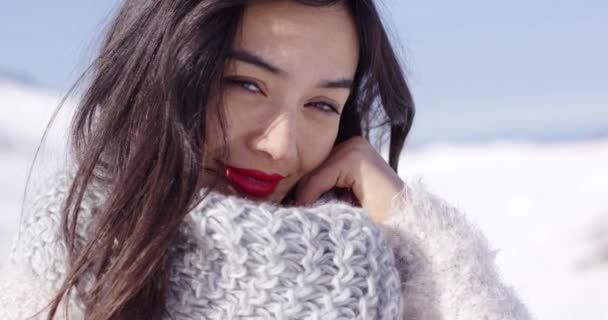 Happy young asian girl enjoys snowy winter — Stock Video