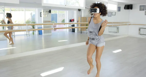 Sexy african american woman dancing with VR glasses — Stock Photo, Image