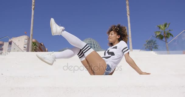 Attractive female posing on stairs — Stock Video