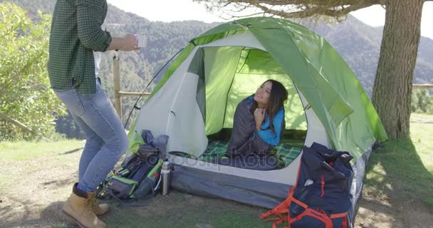 Couple taking rest after trekking — Stock Video