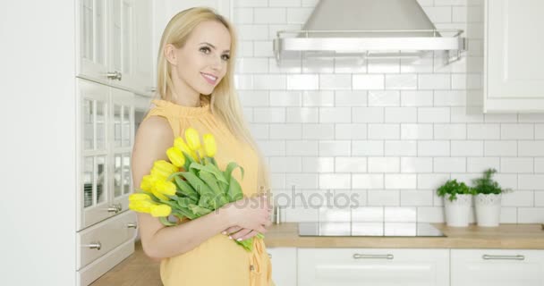 Lovely girl with bouquet of tulips — Stock Video