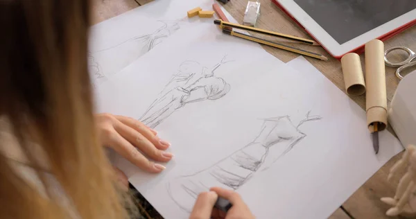 Crop shot of dressmaker drawing sketches — Stock Photo, Image