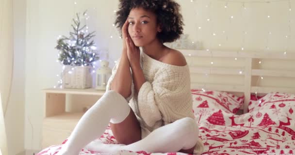 Pensive young woman celebrating Christmas alone — Stock Video