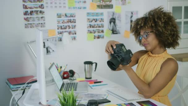 Stylish photographer at creative workplace — Stock Video