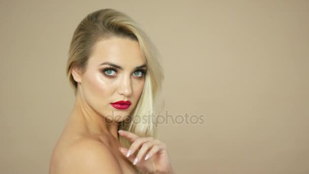 Pretty blonde woman with red lips — Wideo stockowe