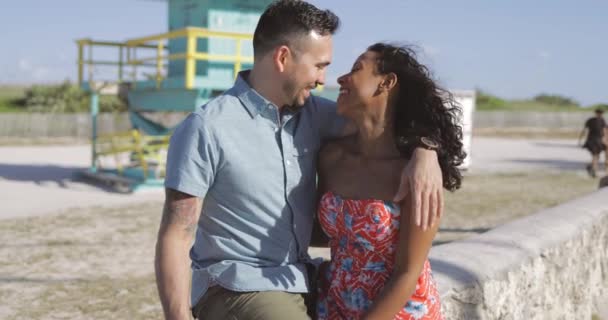 Happy multiracial couple on seafront — Stock Video