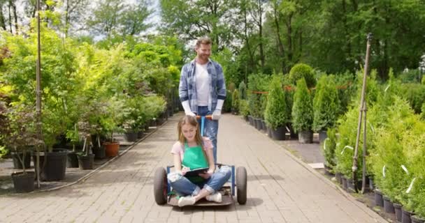 Playful colleagues of botanic garden — Stock Video