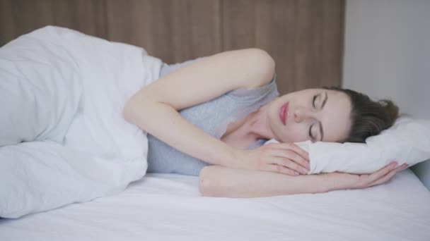 Woman sleeping on mattress — Stock Video