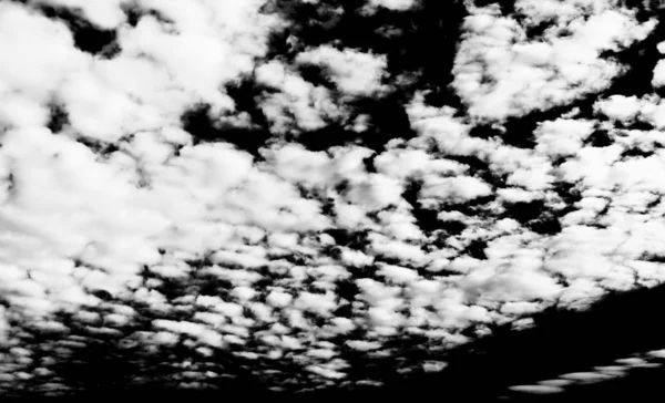 Set of isolated clouds over black. — Stock Photo, Image